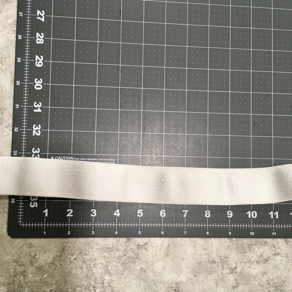 Plush Elastic / White + Silver Glitter - Sold by the half yard